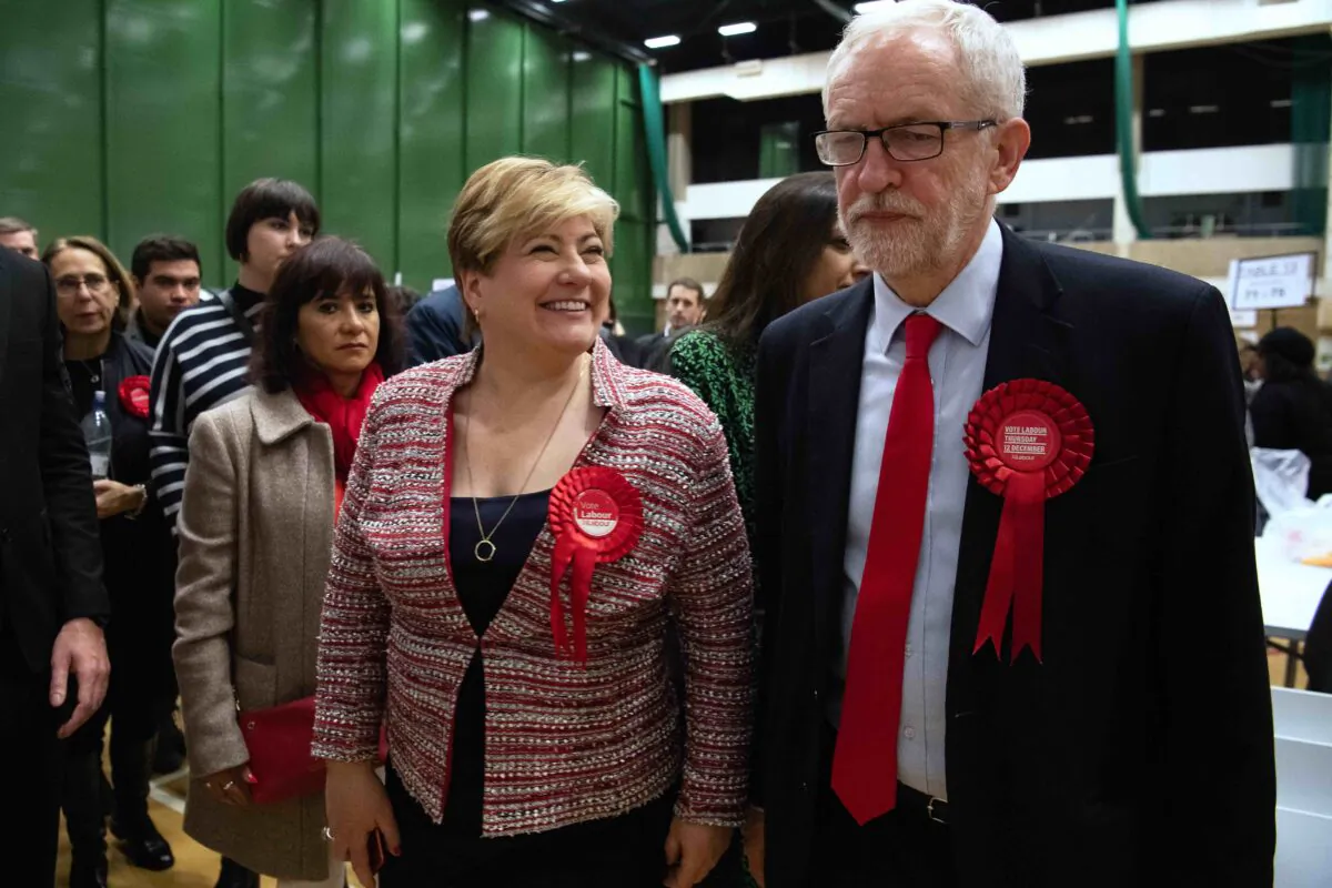 UK Labour Party leader Jeremy Corbyn (R) and Shadow Foreign Secretary Emily Thornberry meet after both retaining their Parliamentary seats following the count at Sobell leisure centre in London, England, on Dec. 13, 2019. (Leon Neal/Getty Images)