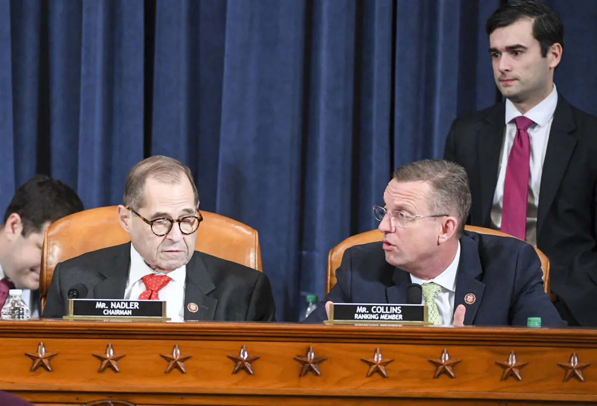 Rep. Doug Collins (R-GA) and ranking member of the House Judiciary Committee, (R) voices his displeasure with  Rep. Jerrold Nadler, (D-NY) and chairman of the House Judiciary Committee after he abruptly delayed voting until Friday during a House Judiciary Committee markup of Articles of Impeachment against President Donald Trump at the Longworth House Office Building in Washington, on Dec. 12, 2019. (Jonathan Newton/Pool/Getty Images)