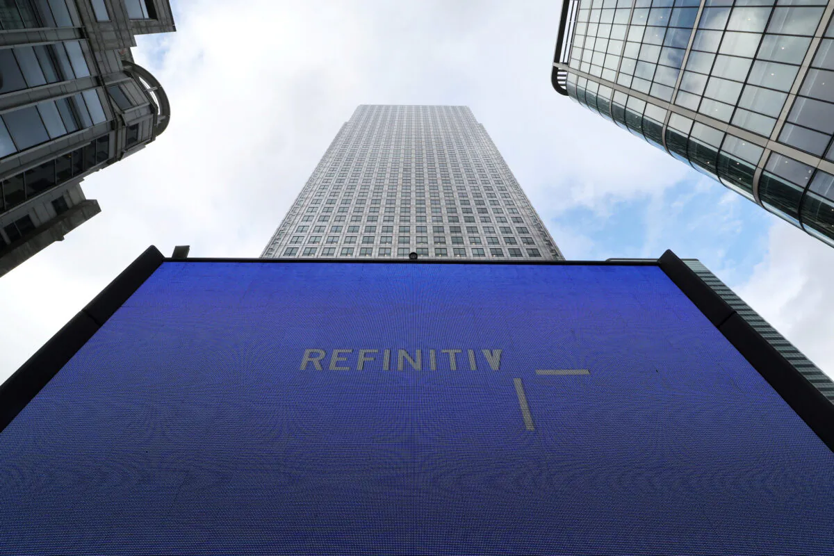 An advertisement for Refinitiv is seen on a screen in London's Canary Wharf financial center, Britain, on Oct. 2, 2018. (Russell Boyce/Reuters)
