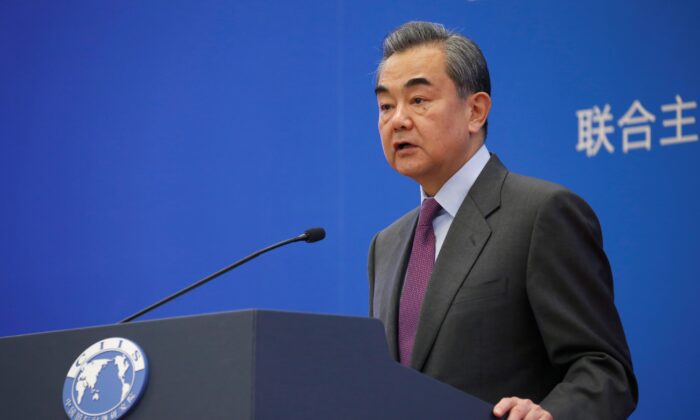 Chinese Foreign Minister Wang Yi delivers a speech at an annual symposium on international situation and China's diplomacy in Beijing on Dec. 13, 2019. I(Jason Lee/Reuters)