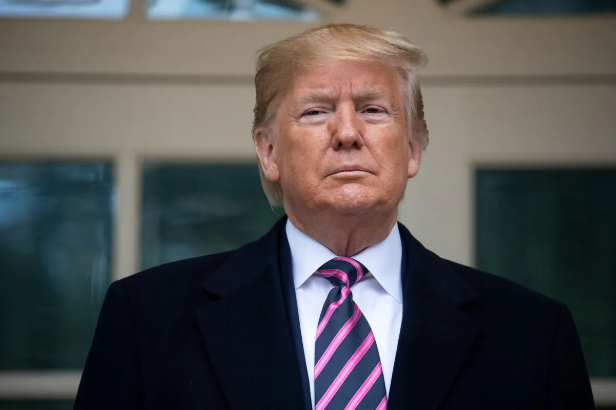 President Donald Trump poses for photos as he meets with Paraguay's President Mario Abdo Benitez at the White House, Friday, Dec. 13, 2019, in Washington. (Evan Vucci/AP Photo)