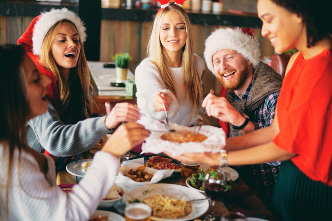 The endless snacks and sumptuous meals can take a toll if we don't tune in. (Milan Ilic Photographer/Shutterstock)