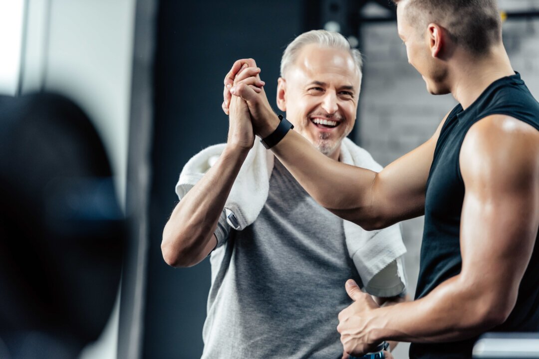 Keep exercise interesting, an exercise buddy or trainer can help, to keep you committed. (LightField Studios/Shutterstock)