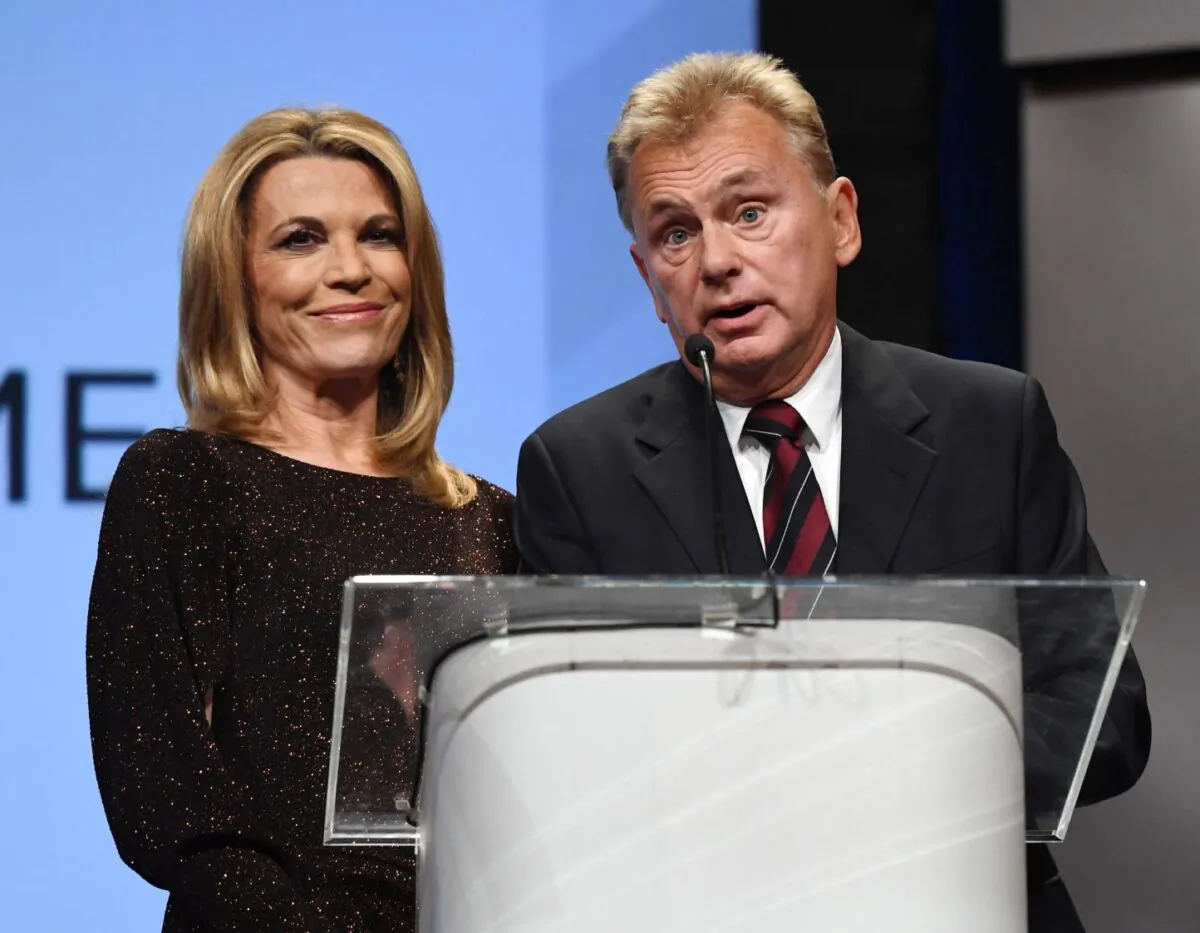 "Wheel of Fortune" hostess Vanna White (L) and host Pat Sajak in a file photo. (Photo by Ethan Miller/Getty Images)