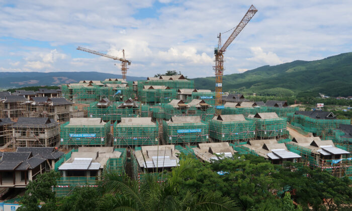 Villas of real estate property "Viva Villa" developed by Ping An Real Estate are seen under construction in Xishuangbanna Dai Autonomous Prefecture, Yunnan Province, China on June 20, 2019. (Lusha Zhang/Reuters)