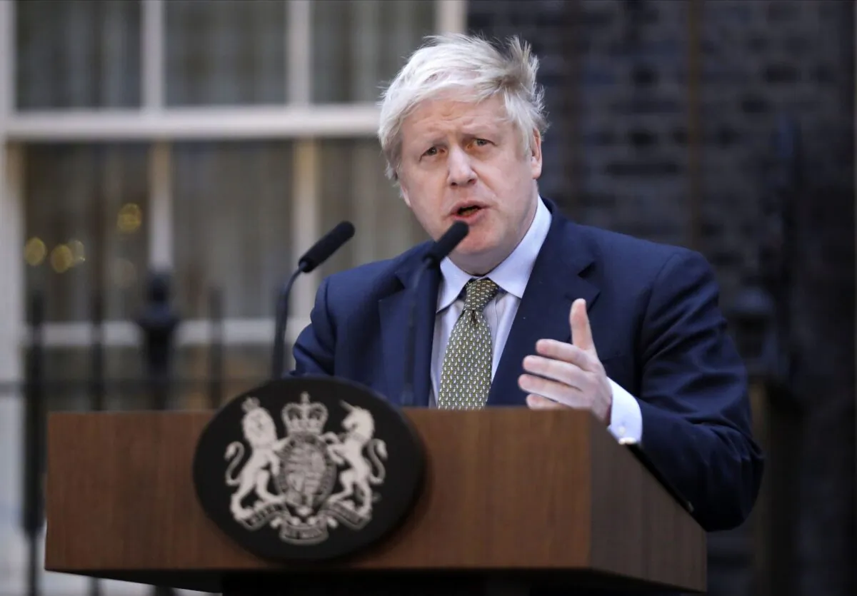British Prime Minister Boris Johnson speaks outside 10 Downing Street in London on Dec. 13, 2019, the day after his election victory. (AP Photo/Matt Dunham)