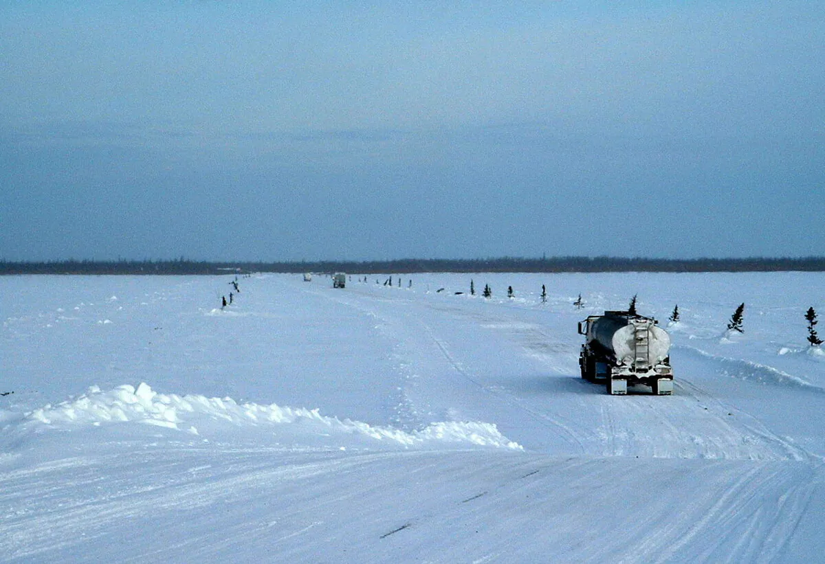 A truck crosses the Albany River on the winter road running from Moosonee to Attawapiskat in the Ring of Fire region in northern Ontario. (Rev40/CC BY-SA 3.0)