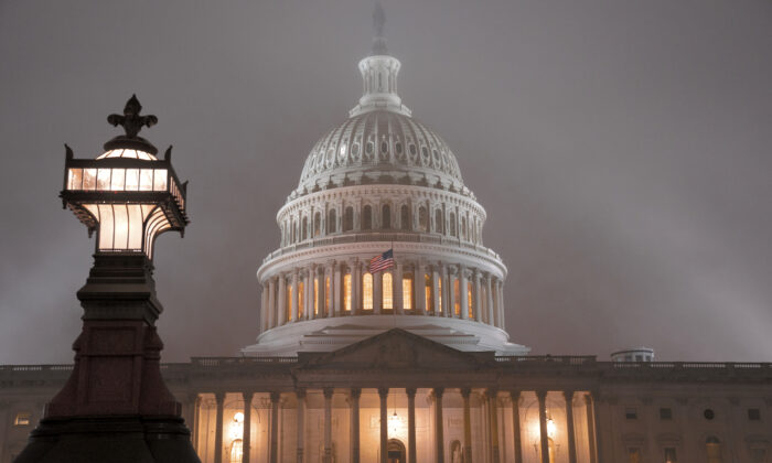 The U.S. Capitol in Washington is shrouded in mist on Dec. 13, 2019. (J. Scott Applewhite/AP Photo)