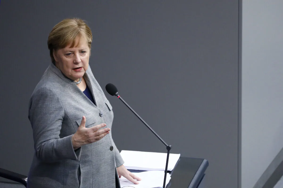 German Chancellor Angela Merkel speaks on behalf of the federal government during a one-hour question and answer session by parliamentarians at the Bundestag on Dec. 18, 2019 in Berlin, Germany. (Michele Tantussi/Getty Images)
