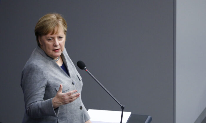 German Chancellor Angela Merkel speaks on behalf of the federal government during a one-hour question and answer session by parliamentarians at the Bundestag on Dec. 18, 2019 in Berlin, Germany.  (Michele Tantussi/Getty Images)
