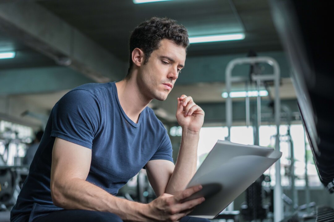 Getting to the gym is a common New Year's resolution, and it is easier to do if you make this goal more specific and maybe even give yourself a reward. (WeStudio/Shutterstock)