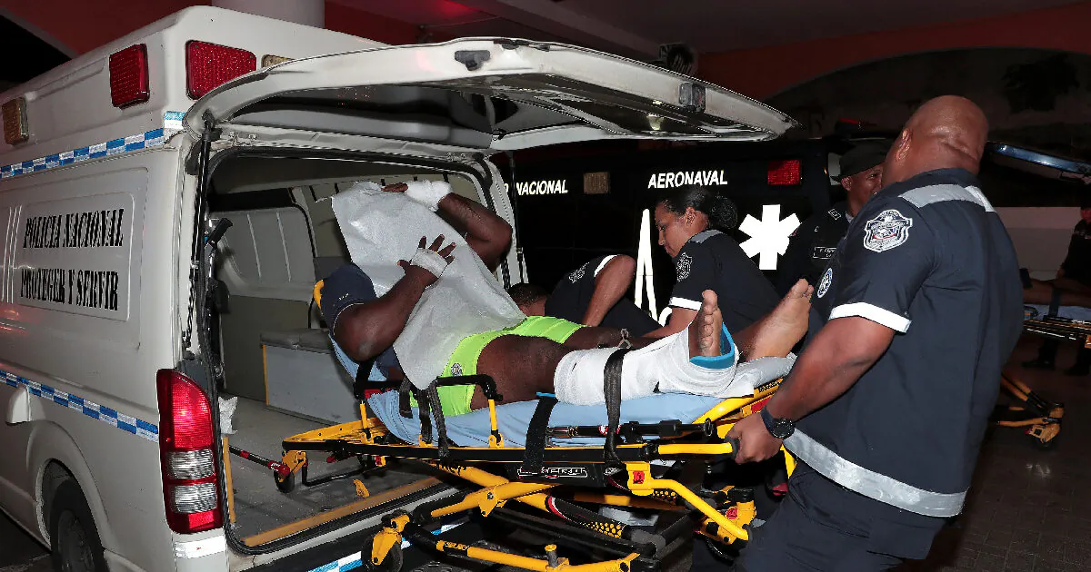 An injured inmate is carried on a stretcher into a hospital by police paramedics after a shootout among inmates at La Joyita prison, in Panama City, Panama on Dec. 17, 2019. (Reuters/Erick Marciscano)