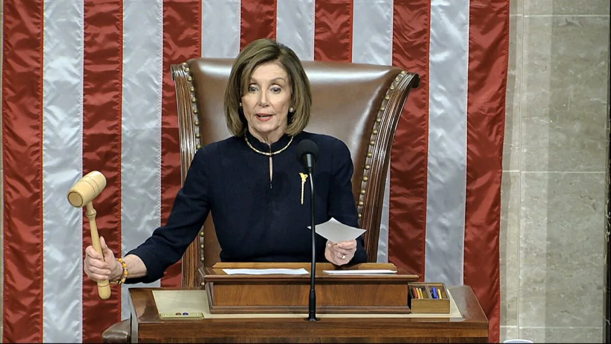 House Speaker Nancy Pelosi (D-Calif.) announces the passage of the first article of impeachment, abuse of power, against President Donald Trump by the House of Representatives at the Capitol in Washington, on Dec. 18, 2019. (House Television via AP)