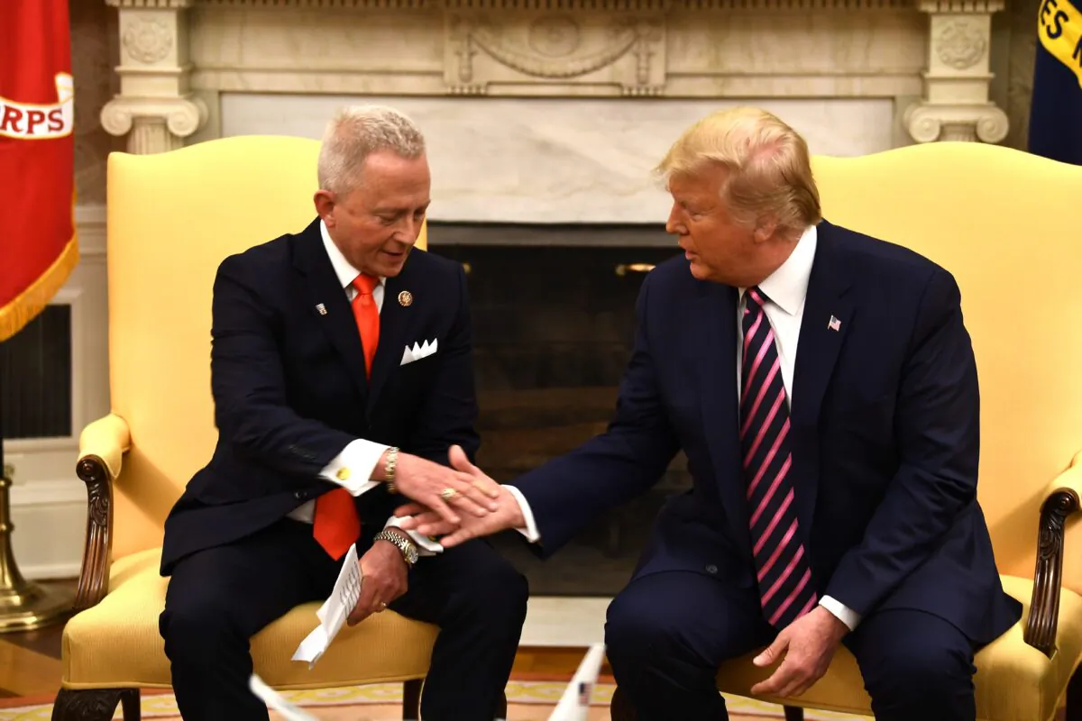 Rep. Jeff Van Drew (L) meets with President Donald Trump in the Oval Office at the White House in Washington, on Dec. 19, 2019. (Brendan Smialowski/AFP via Getty Images)