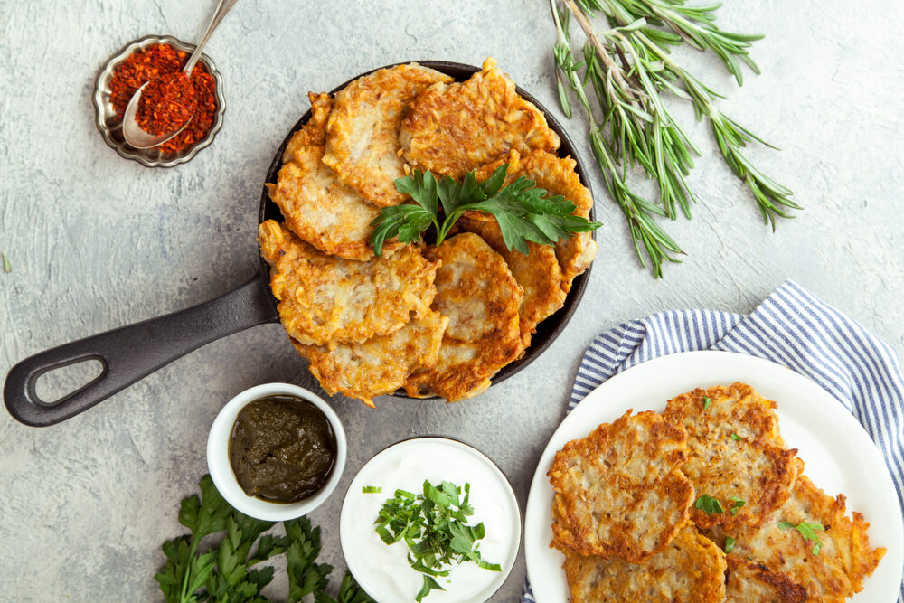 Foods cooked in oil, such as latkes and donuts, are a favorite part of Hanukkah, but they should be shared only with humans. (Shutterstock)