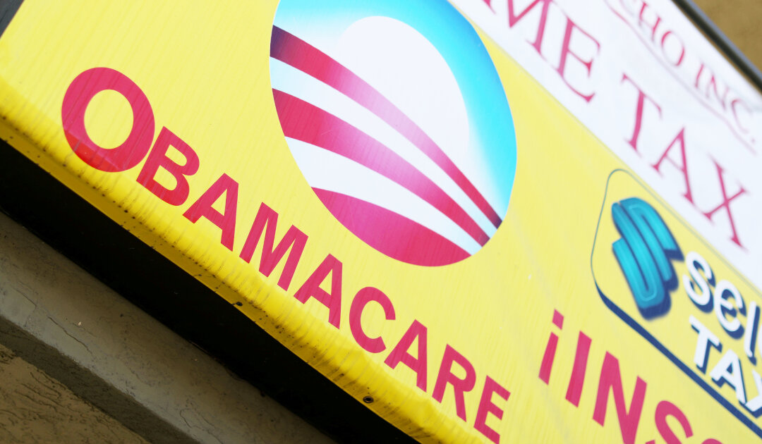 A sign on an insurance store advertises Obamacare in San Ysidro, San Diego, Calif., U.S., Oct. 26, 2017. (Mike Blake/Reuters)
