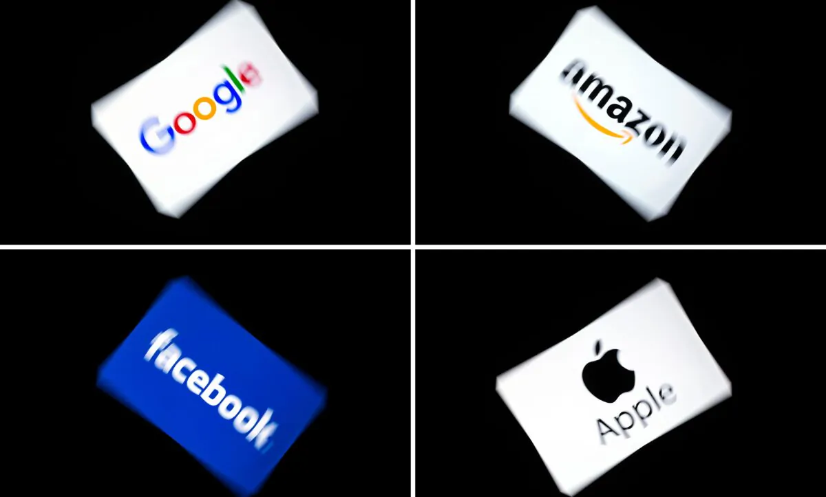(COMBO) This combination of pictures shows the logos of Google, Facebook Amazon, and Facebook displayed on a tablet in Paris, on Feb. 18, 2019. (Lionel Bonaventure/AFP via Getty Images)