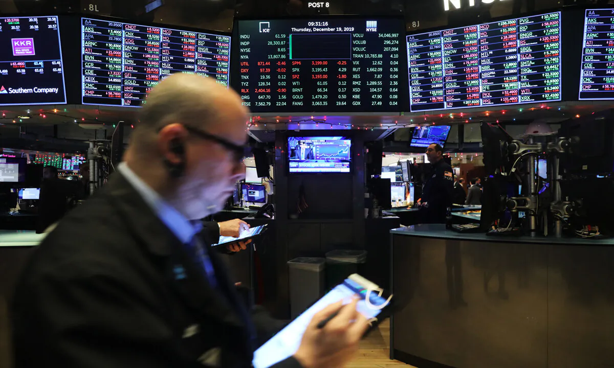 Traders work on the floor of the New York Stock Exchange (NYSE) the morning after U.S. President Donald Trump was impeached by the House of Representatives, in New York City, on Dec, 19, 2019. (Spencer Platt/Getty Images)