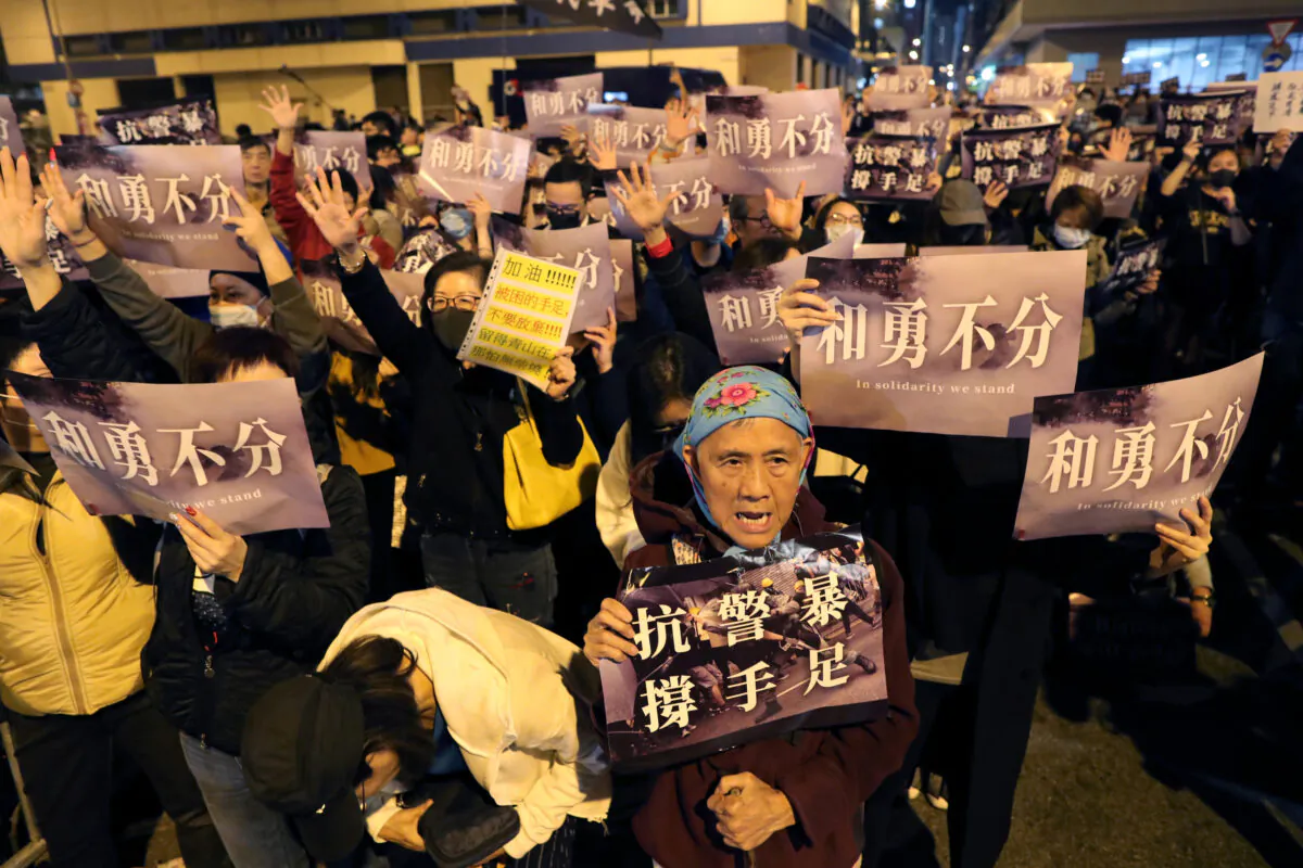 Hong Kong protesters gather outside a detention center in Lai Chi Kok to demand the release of protesters in Hong Kong, China on Dec. 20, 2019. (Lucy Nicholson/Reuters)