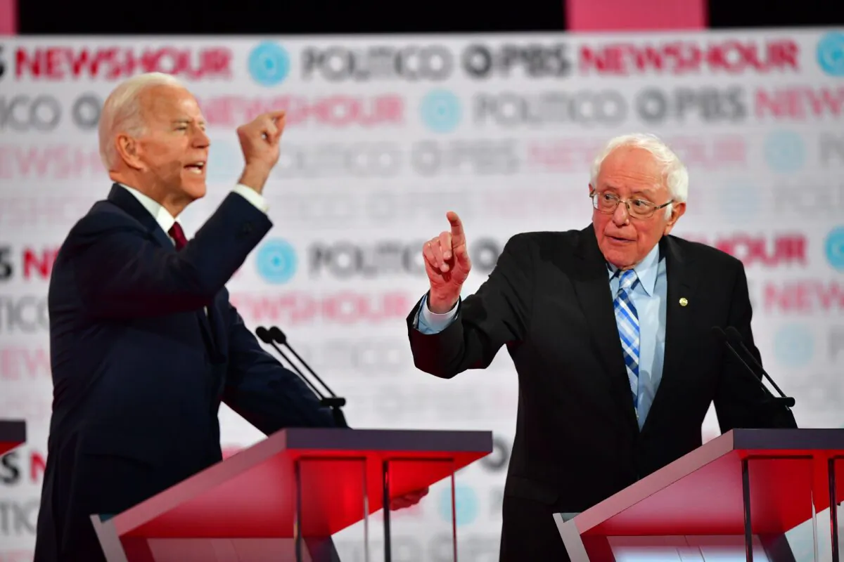 Then Democratic presidential hopeful former Vice President Joe Biden, left, and Sen. Bernie Sanders (I-Vt.) participate in the sixth Democratic primary debate of the 2020 presidential campaign season at Loyola Marymount University in Los Angeles, Calif., on Dec. 19, 2019. (Frederic J. Brown/AFP via Getty Images)