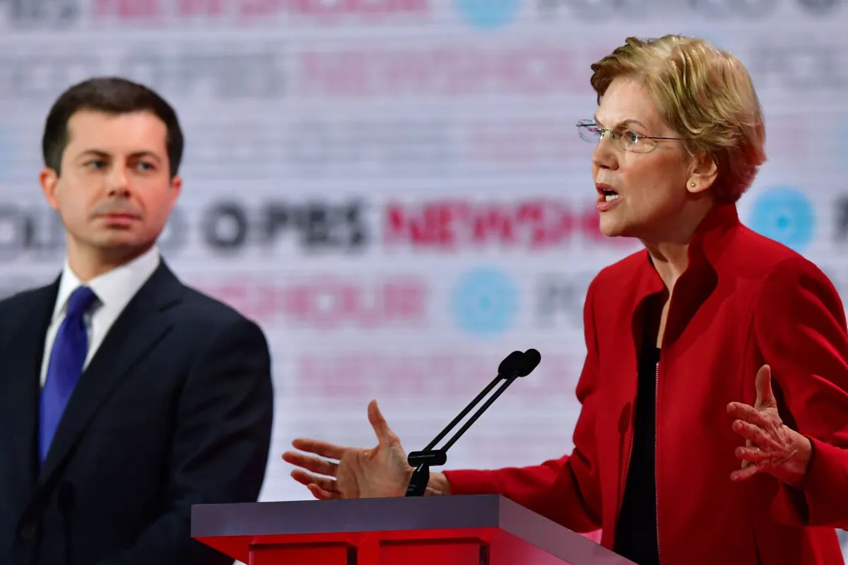 Democratic presidential hopefuls Sen.  Elizabeth Warren (D-Mass.) speaks as and South Bend Mayor Pete Buttigieg looks on during the sixth Democratic primary debate of the 2020 presidential campaign season at Loyola Marymount University in Los Angeles, California on Dec. 19, 2019. (Frederic J. Brown/AFP via Getty Images)