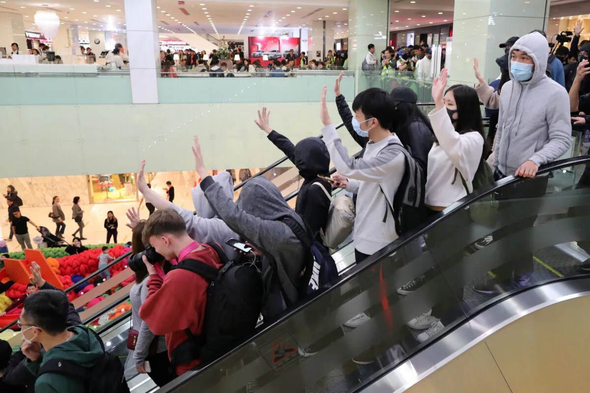 Hong Kong protesters march in Harbour City shopping mall in Hong Kong, China, Dec. 21, 2019. (Reuters/Lucy Nicholson)