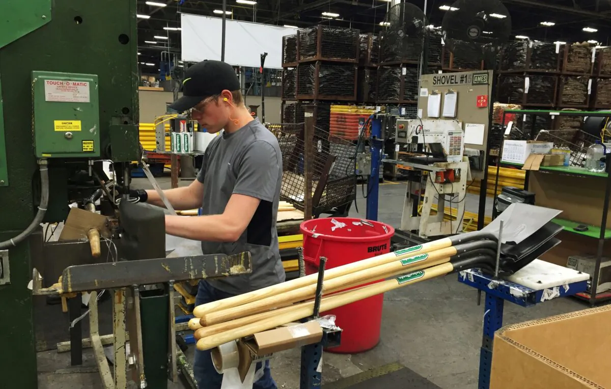 A production line employee is pictured working at the AMES Company's shovel manufacturing factory in Camp Hill, Pennsylvania, on June 29, 2017. (Reuters/Tim Aeppel)