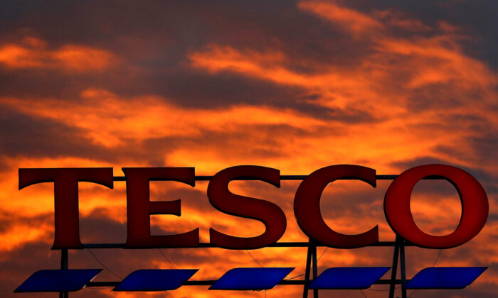 A company logo is pictured outside a Tesco supermarket in Altrincham northern England, on April 16, 2016. (Phil Noble/Reuters)