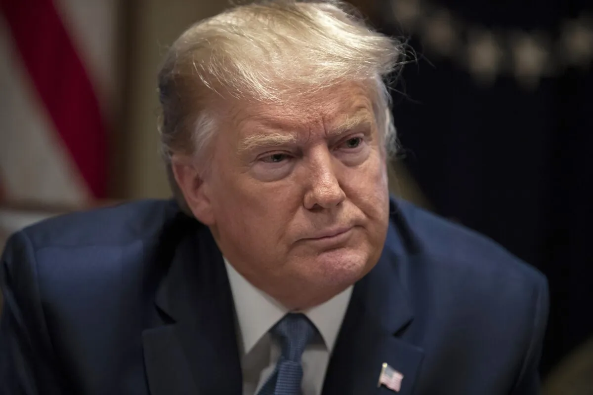 President Donald Trump listens during a roundtable with governors on government regulations in the Cabinet Room of the White House in Washington on Dec. 16, 2019. (Evan Vucci/AP Photo)