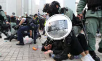Clashes as Police Try to Clear Hong Kong Protesters After Uyghur Support Rally