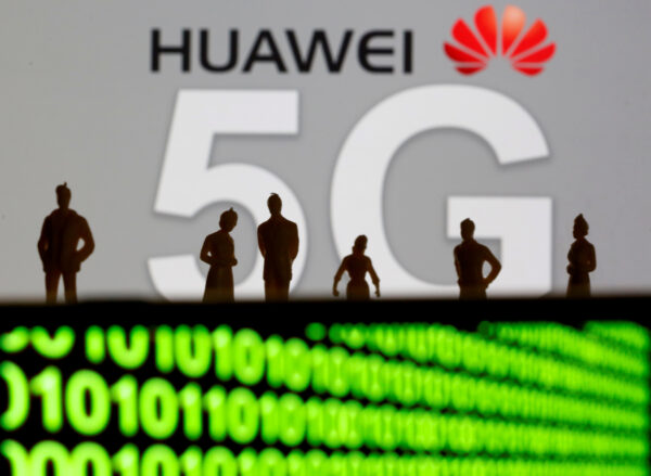 Huawei and 5G logos are shown with with sihouetted figures