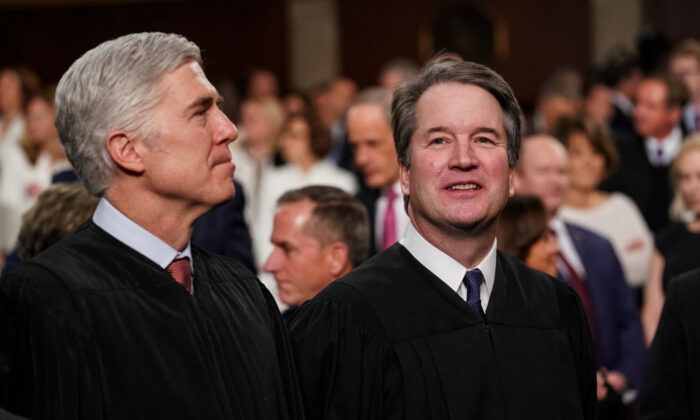 Supreme Court Justices Neil Gorsuch and Brett Kavanaugh attend the State of the Union address in the chamber of the U.S. House of Representatives at the U.S. Capitol Building on Feb. 5, 2019. (Doug Mills-Pool/Getty Images)