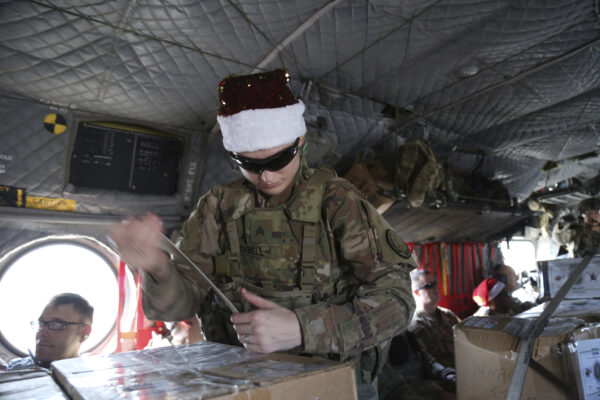 A U.S. soldier secures Christmas gifts