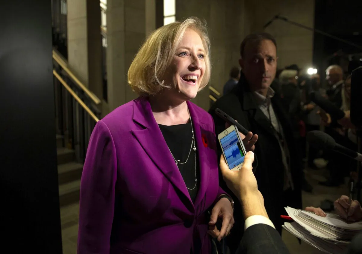 Former Conservative MP Lisa Raitt, who lost her seat in the election, speaks to reporters before attending a caucus meeting on Parliament Hill in Ottawa on Nov. 6, 2019. Raitt will help lead the effort to elect party leader Andrew Scheer's replacement. (The Canadian Press/Justin Tang)