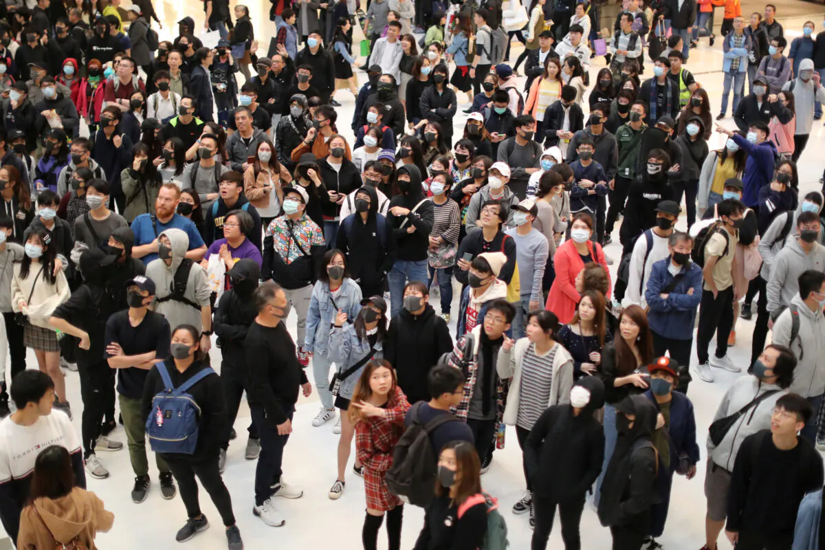 Hong Kong protesters attend a Christmas Day rally in Sha Tin shopping mall in Hong Kong, China on Dec. 25, 2019. (Lucy Nicholson/Reuters)