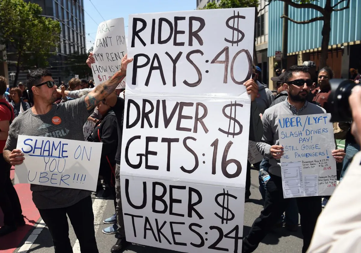 Protesters block an intersection near Uber's corporate headquarters in San Francisco, Calif., on May 8, 2019. (Josh Edelson/AFP via Getty Images)