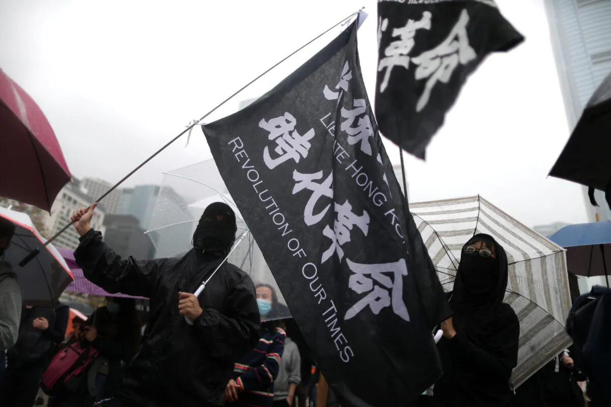 Anti-government demonstrators take part in a protest in Edinburgh Place in Hong Kong, China, Dec. 29, 2019. (Reuters/Lucy Nicholson)