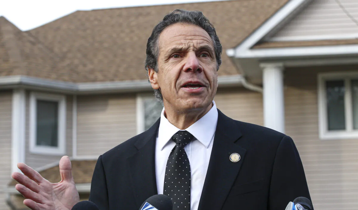 New York Governor Andrew Cuomo speaks to the media outside the home of rabbi Chaim Rottenbergin in Monsey, N.Y., on Dec. 29, 2019 after a machete attack that took place earlier outside the rabbi's home during the Jewish festival of Hanukkah in Monsey, N.Y. (Kena Betancur/AFP via Getty Images)