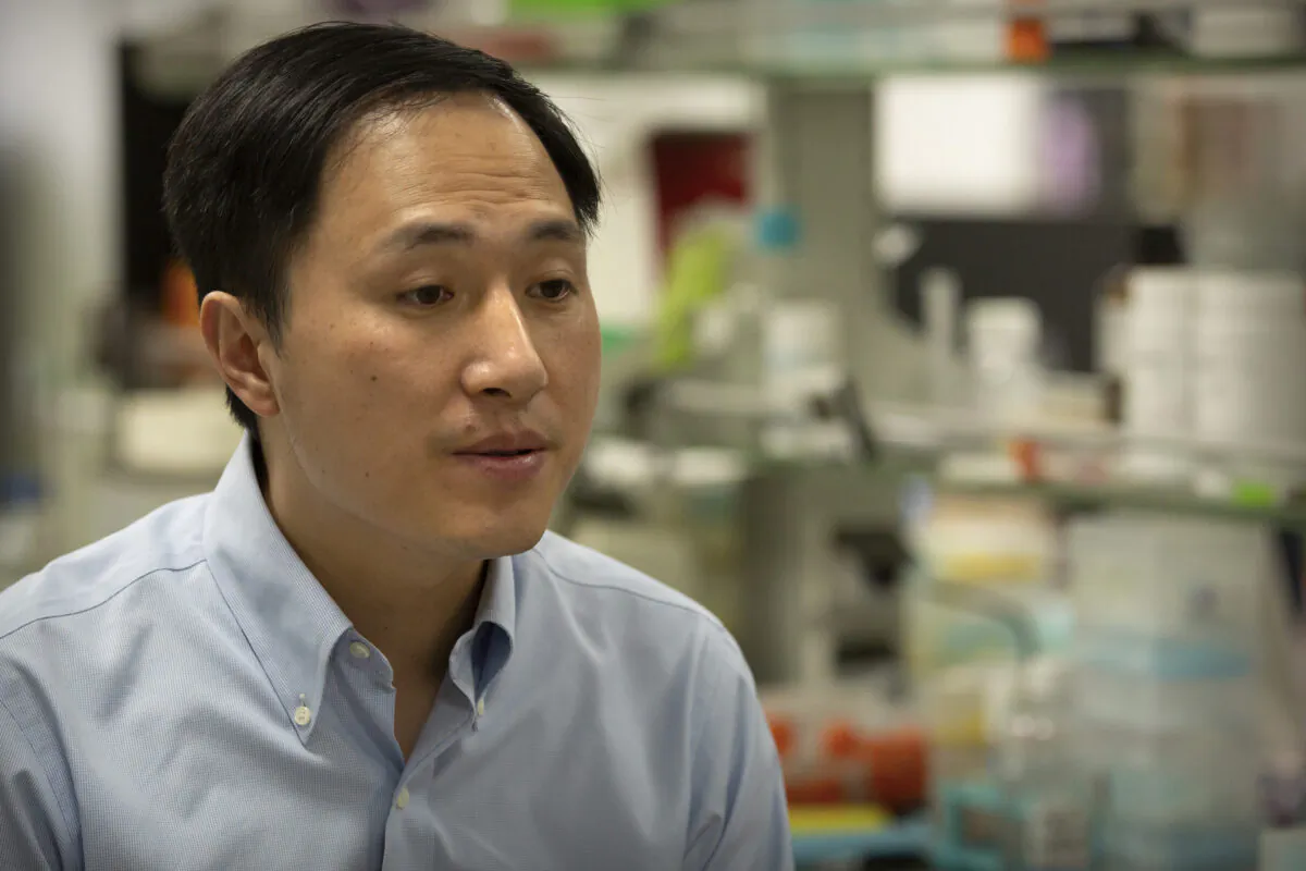 Chinese scientist He Jiankui speaks during an interview at his laboratory in Shenzhen in southern China's Guangdong Province on Oct. 10, 2018. Chinese state media says the researcher He has been sentenced to three years for practicing medicine illegally. He Jiankui was also fined 3 million yuan. Two others were also sentenced on the same charge. (Mark Schiefelbein/AP Photo)