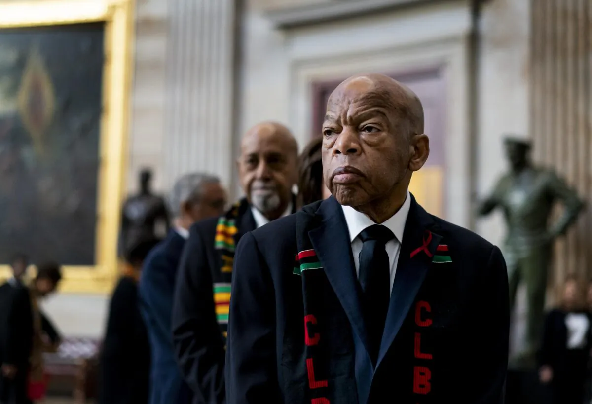 Civil Rights activist Congressman John Lewis (D-GA) prepares to pay his respects to U.S. Rep. Elijah Cummings (D-MD) who lies in state within Statuary Hall during a memorial ceremony on Capitol Hill in Washington on Oct. 24, 2019. (Melina Mara-Pool/Getty Images)