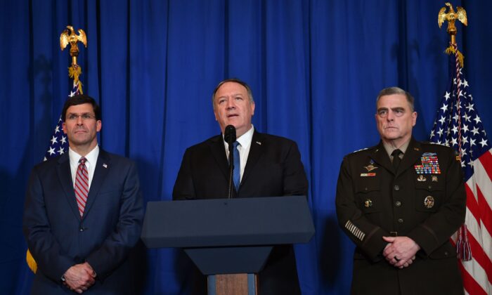 U.S. Secretary of State Mike Pompeo (C), U.S. Secretary of Defense Mark Esper (L) and Chairman of the Joint Chiefs of Staff US army general Mark A. Milley (R) speak on stage during a briefing on the past 72 hours events in Mar a Lago, Palm Beach, Florida, on Dec. 29, 2019. (Nicholas Kamm/AFP via Getty Images)