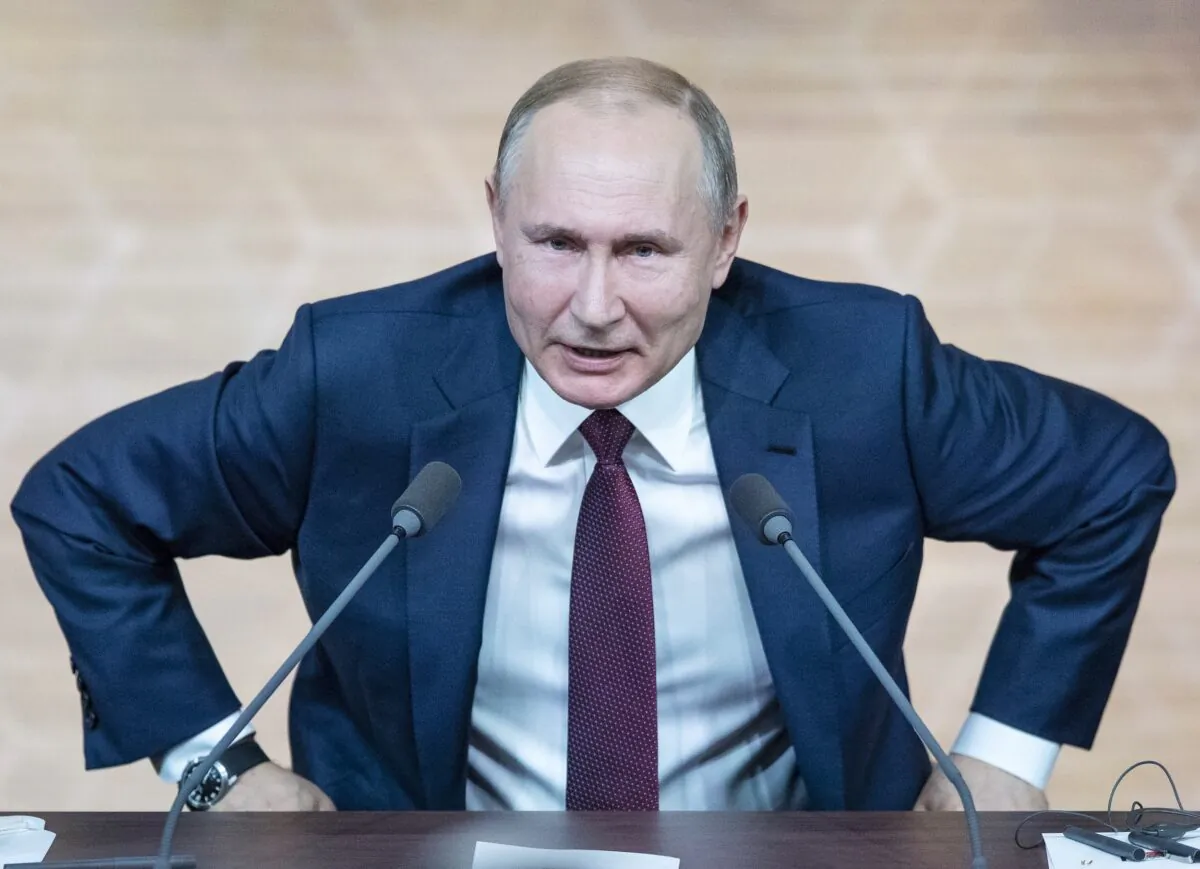 Russian President Vladimir Putin leaves his annual news conference in Moscow, Russia on Thursday, Dec. 19, 2019. (Pavel Golovkin/AP-File)