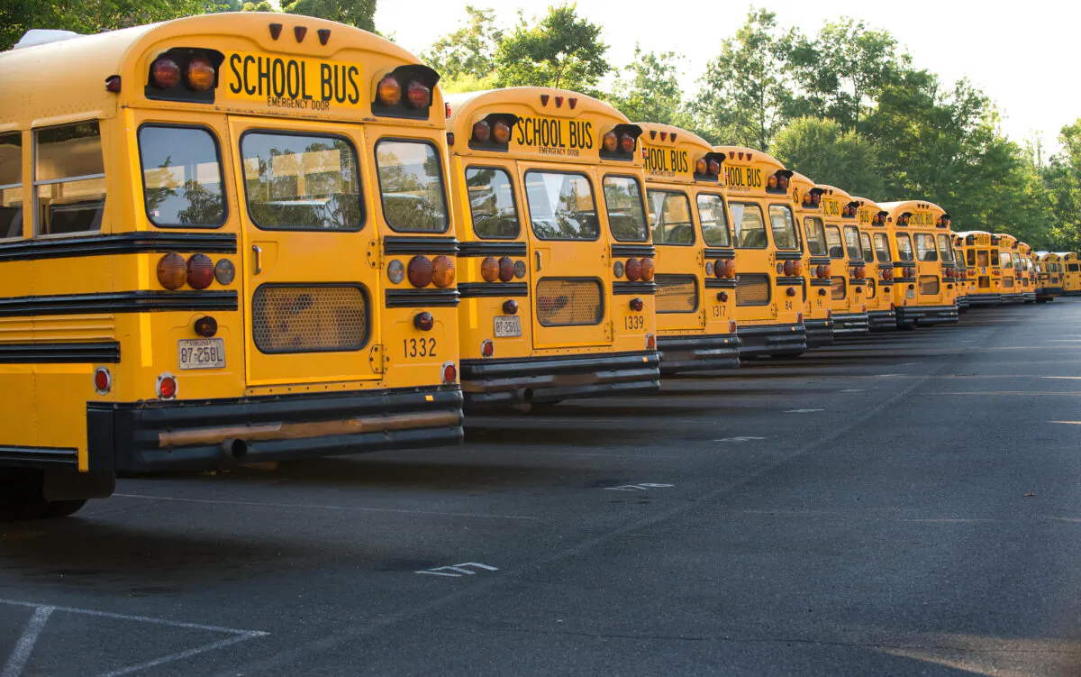 File photo showing school buses in a parking lot in Fairfax, Va., on June 24, 2008. (Paul J. Richards/AFP via Getty Images)