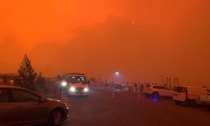 The sky glows red as bushfires continue to rage in Mallacoota, Victoria, Australia, on Dec. 31, 2019. (Melbourne/via Reuters)