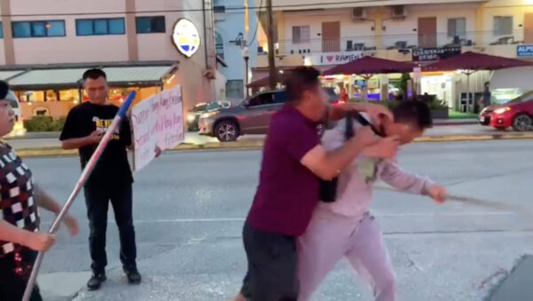 protest clash saipan