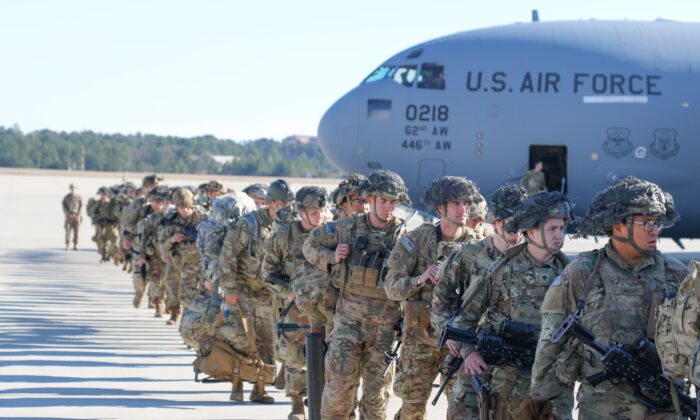 U.S. Army Paratroopers of the 82nd Airborne Division, deploy from Pope Army Airfield, North Carolina, heading to the U.S. Central Command area in response to events in Iraq, on Jan. 1, 2020. (Capt. Robyn Haake/U.S. Army/AFP via Getty Images)