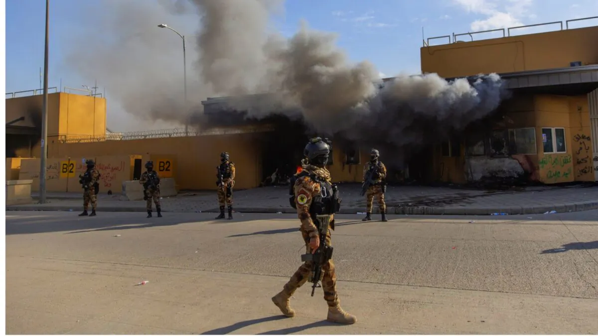 Iraqi army soldiers are deployed in front of the U.S. Embassy in Baghdad, Iraq, on Jan. 1, 2020. (Nasser Nasser/AP Photo)