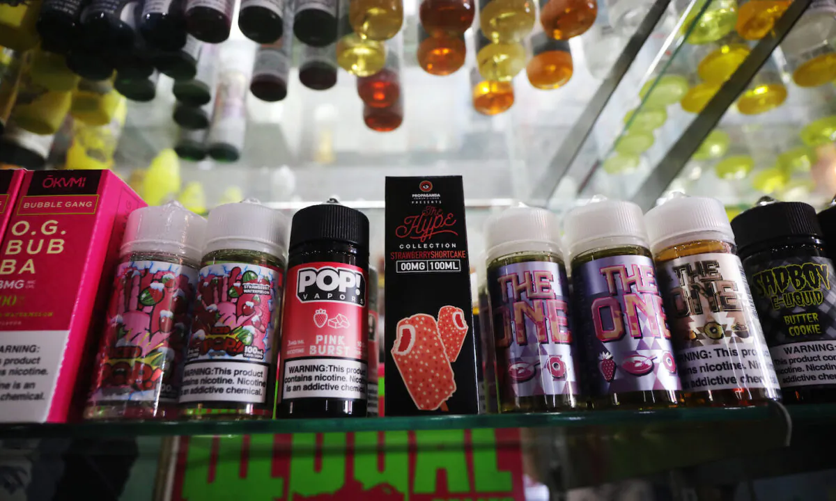 Vaping products, including flavored vape liquids and pods, are displayed at Gotham Vape in New York City on Sept. 17, 2019. (Spencer Platt/Getty Images)