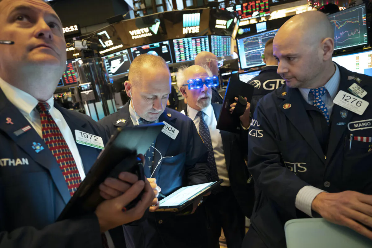 Stock traders work at New York Stock Exchange, Tuesday, Dec. 31, 2019. (Mark Lennihan/AP)