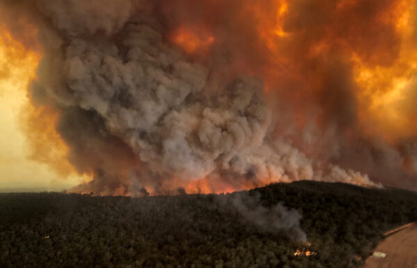 Smoke billows during bushfires in Bairnsdale